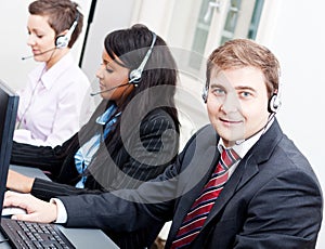 Smiling callcenter agent with headset support