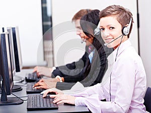 Smiling callcenter agent with headset support