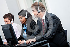 Smiling callcenter agent with headset support