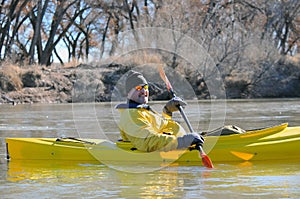 Smiling canoeist on river