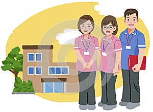 Smiling caregivers in pink uniform and nursing house