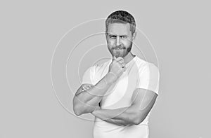 smiling casual guy in studio. photo of caucasian guy wear white shirt. guy wearing casual style.