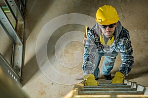 Contractor on a Ladder