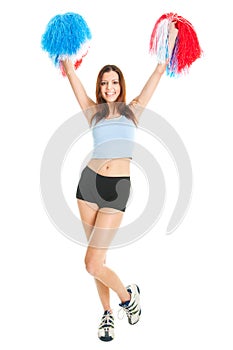 Smiling cheerleader girl posing with pom poms photo