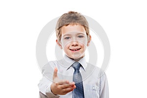 Smiling child boy gesturing hand greeting or meeting handshake