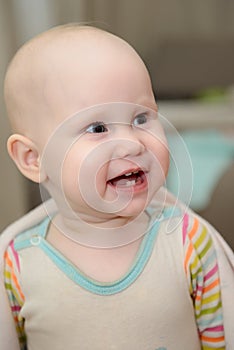 Smiling child with four teeth erupted photo