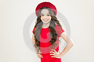 Smiling child. Kid happy cute face adorable curly hair yellow background. Lucky and beautiful. Beauty tips for tidy hair
