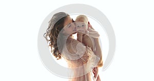 Smiling child with mother on a white background, maternal love and care.