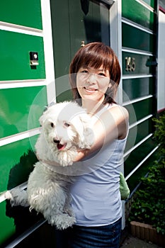 Smiling chinese girl with dog