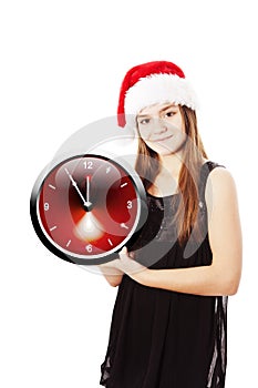 Smiling christmas girl holding oclock over white