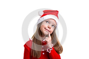 Smiling christmas girl wearing a santa hat isolated over a white background, closeup