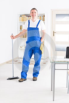 Smiling cleaner at the office