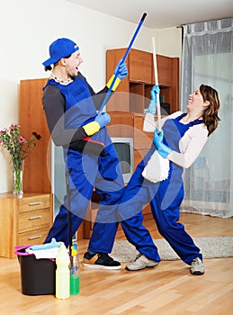Smiling cleaning team at work
