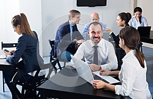 Smiling colleagues having a productive day at work