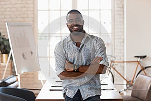 Smiling confident african american young businessman portrait. photo
