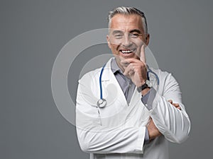 Smiling confident doctor portrait