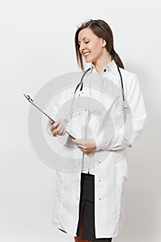 Smiling confident young doctor woman with stethoscope, glasses isolated on white background. Female doctor in medical