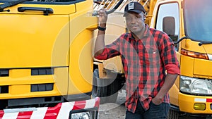 Smiling confident Young Man owner Truck Driver in Business Long transport