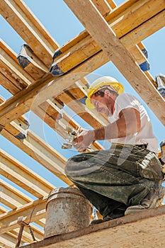 Smiling construction worker under slab girders