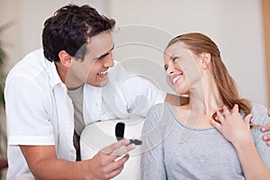 Smiling couple just got engaged