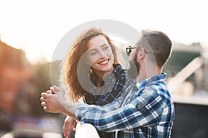 Smiling couple in love, walking and talking outdoors