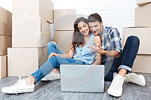 Smiling couple ready to move out