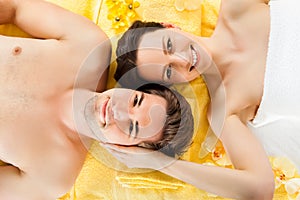 Smiling Couple Relaxing In Beauty Spa