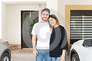 Smiling Couple Relocating In New House