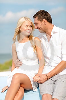 Smiling couple at sea side