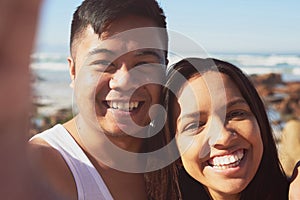 Smiling, couple and selfie at beach in Mexico for memory, vacation and holiday in nature. Ocean, man and woman together