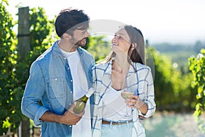Smiling couple with wine