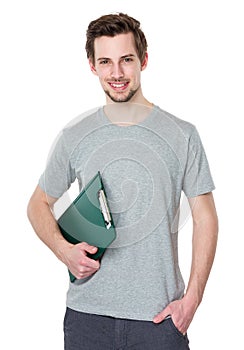 Smiling courier man holding clipboard on white background