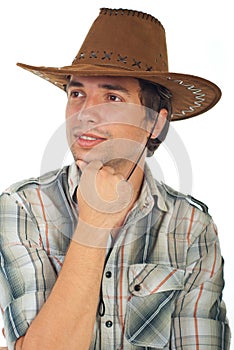 Smiling cowboy looking away