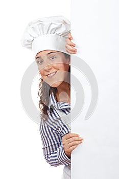 Smiling curious cook woman