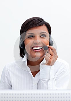 Smiling customer service agent with headset on