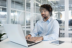 Smiling customer service representative working in modern office