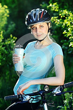 Smiling cyclist girl