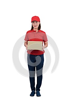 Smiling delivery woman in red uniform giving parcel boxes, isolated on white background