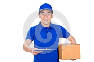 Smiling deliveryman holding box and giving clipboard