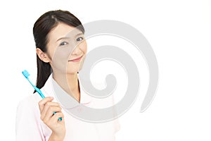 Smiling dental hygienist