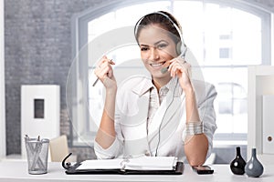 Smiling dispatcher with headset