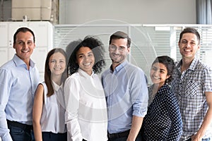 Smiling diverse office workers group, multiracial employees photo