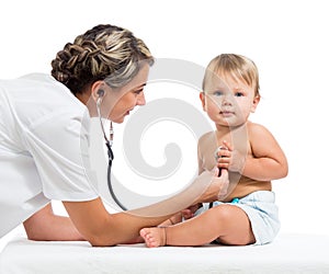 Smiling doctor examining baby girl