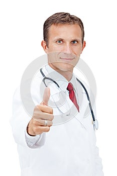 Smiling doctor express happiness with thumb up.