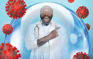 Smiling doctor is happy to win against the coronavirus inside a glass sphere. Cyan background