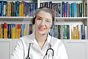 Smiling doctor headset online consultation