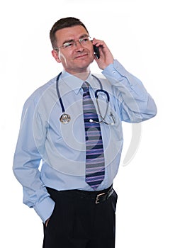 Smiling doctor makes phone call
