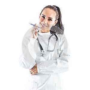Smiling doctor or nurse with pen and stethoscope around her neck - Isolated on white