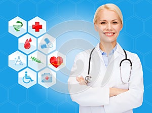 Smiling doctor over medical icons blue background