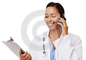 Smiling Doctor Reading Clipboard While Using Smart Phone